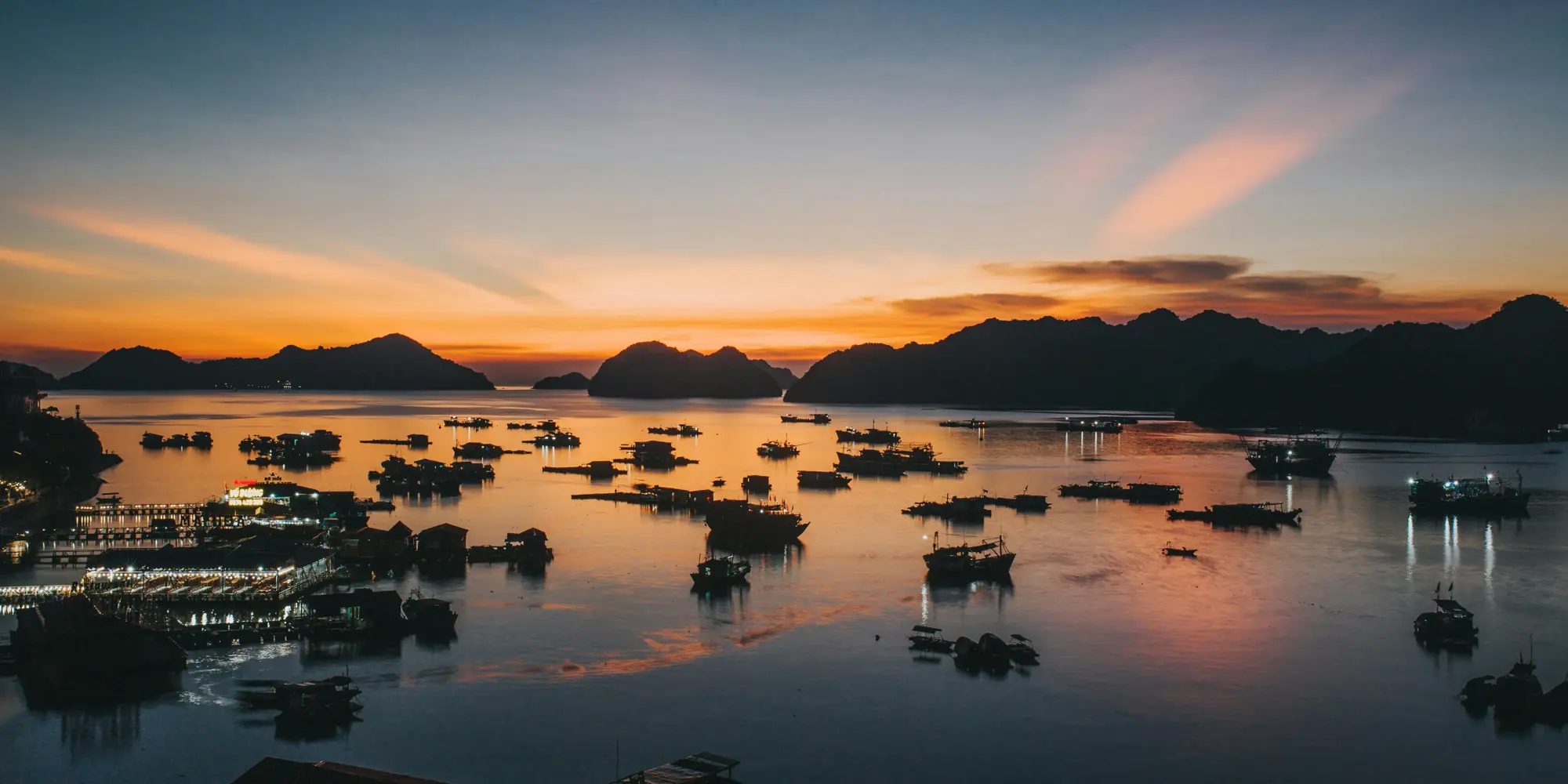 Vietnam tauchen mit haien meerblick bei sonnenuntergang mit fesen und booten